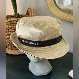 THE NORTH FACE Khaki Bucket Hat with Blue Trim band. Size M .